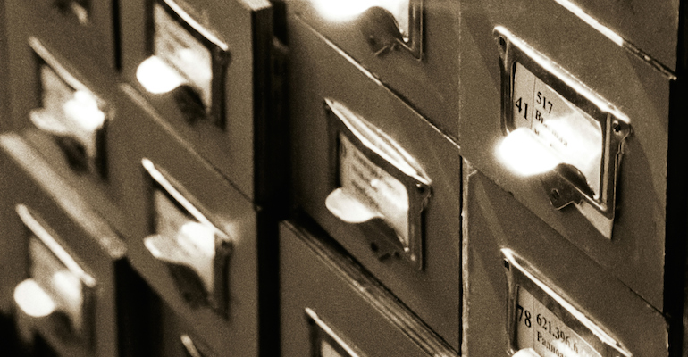 File cabinets representing state adoption law updates