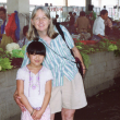 Melissa and Maya Ludtke at the Xiaxi market in 2004, the trip that inspired Touching Home in China