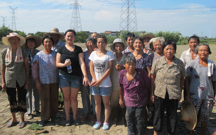 Jennie Lytel-Sternberg with residents of the village where she was found in China