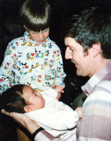 Emily Greene Thornton as an infant on her adoption day, with her adoptive father and brother