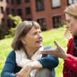 An adoptee and her mother discussing her birth father reunion