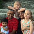 author Lakshmi Iyer with her family through transracial adoption