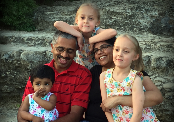 author Lakshmi Iyer with her family through transracial adoption