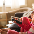 children watching a television show with an adoption theme