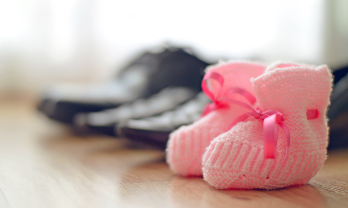 pink baby shoes help keep a spirits up during the wait to adopt