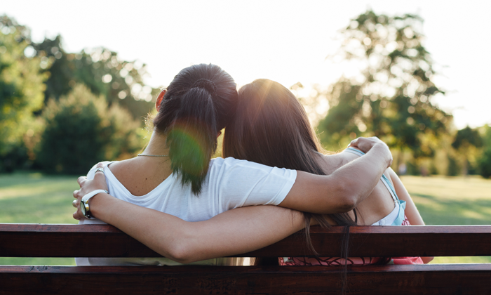 An adoptive mother and her teen daughter share a moment of empathy and connection