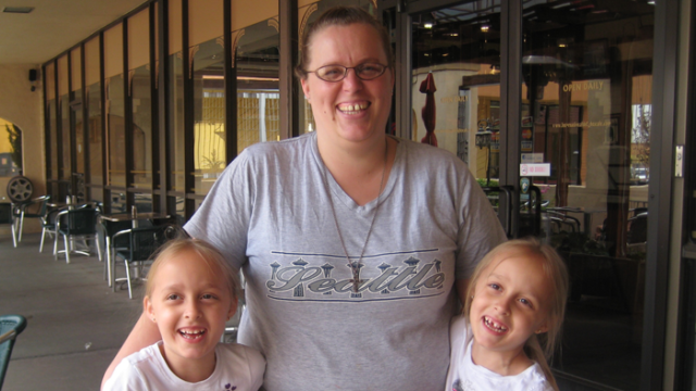 author Brandy Stein with her twin daughters during an open adoption visit