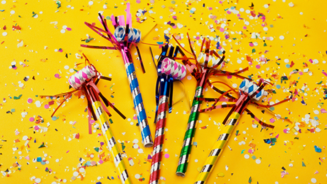 party blowers and confetti to celebrate at an adoption shower