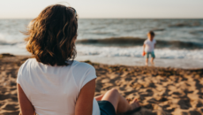 An adoptive mother watches her son at the beach and thinks about contact with his birth mother