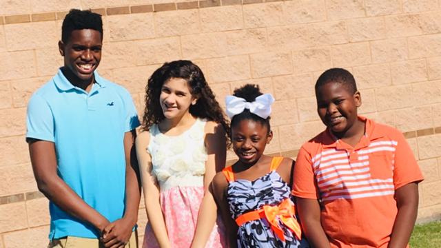 Four of author Billy Cuchens's children through transracial adoption